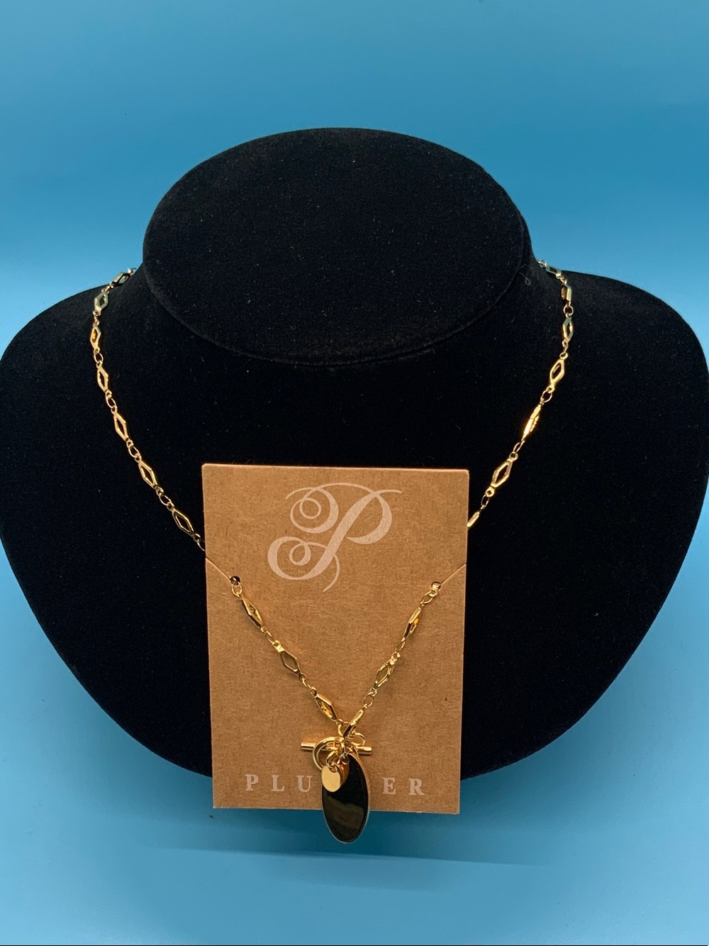 Plunder Gold-Tone Layered Pendant Necklace with Black Accent